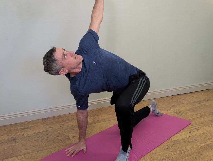 Derek demonstrating a mobility exercise