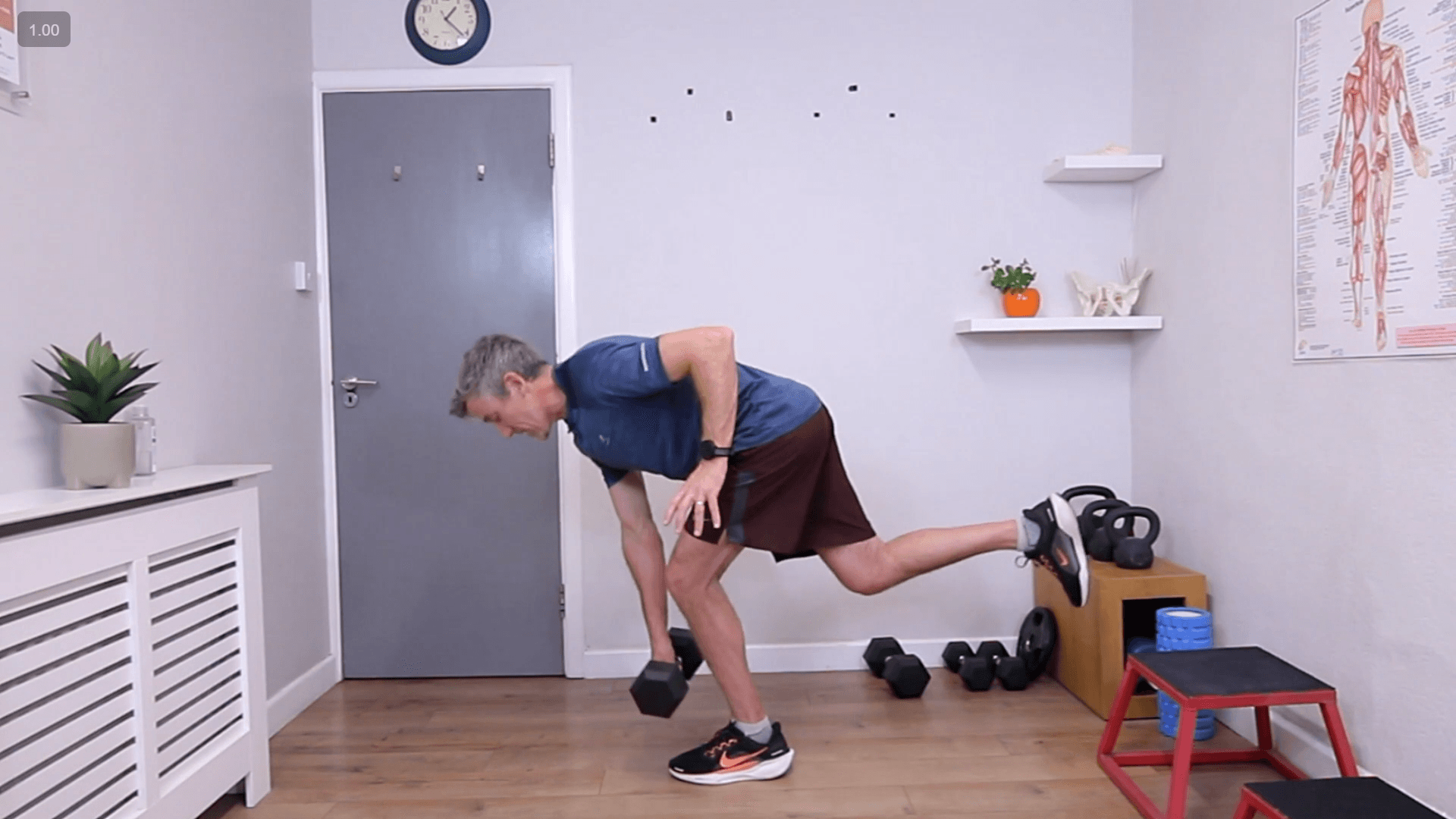 Derek demonstrating a single-leg strength exercise